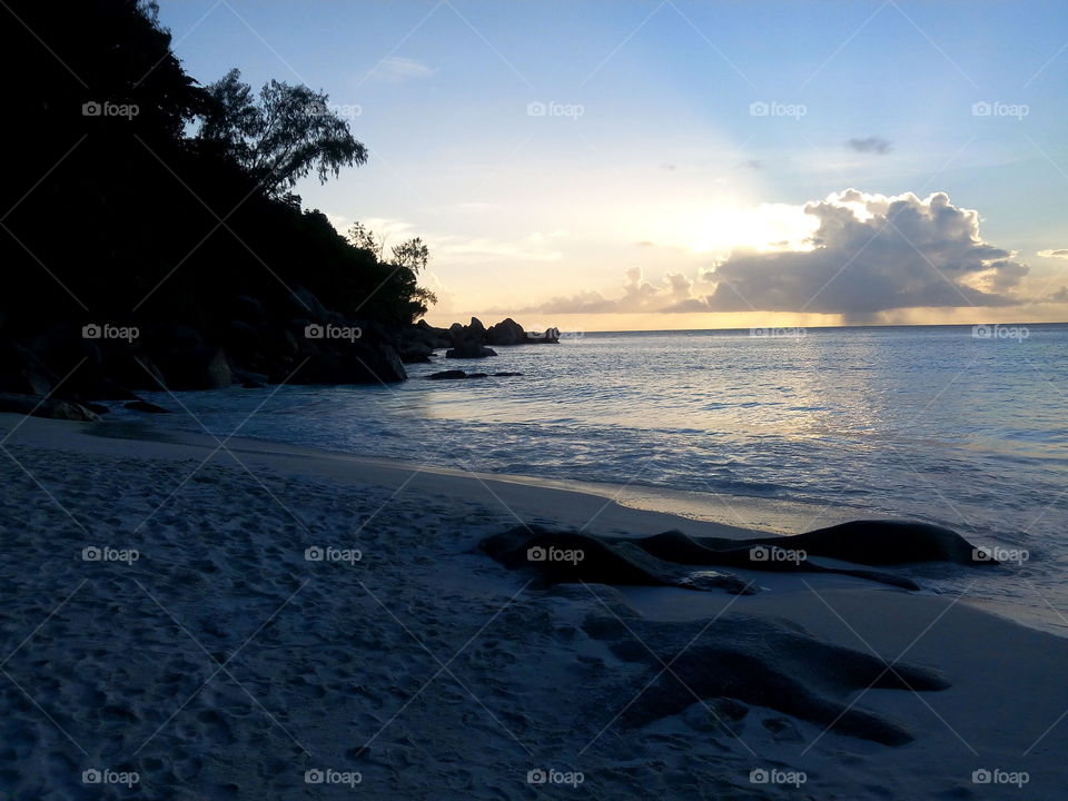Seychelles - Romantic beach sunset in Praslin