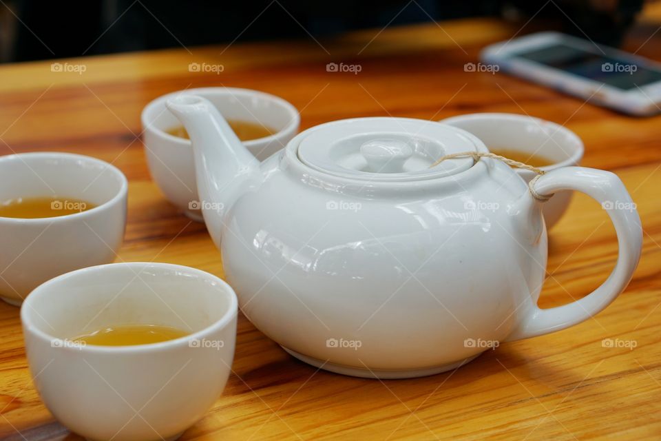 hot tea in white coffee cup