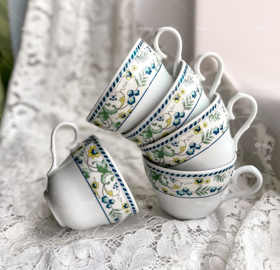 Old porcelain white cups with blue pattern