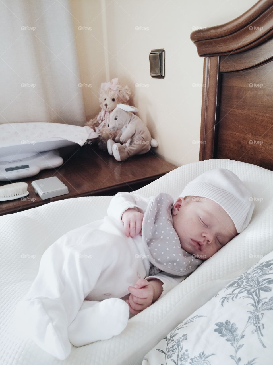 Cute baby sleeping in bed