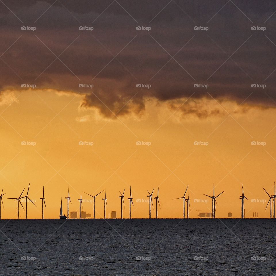 Windmills in sunset 