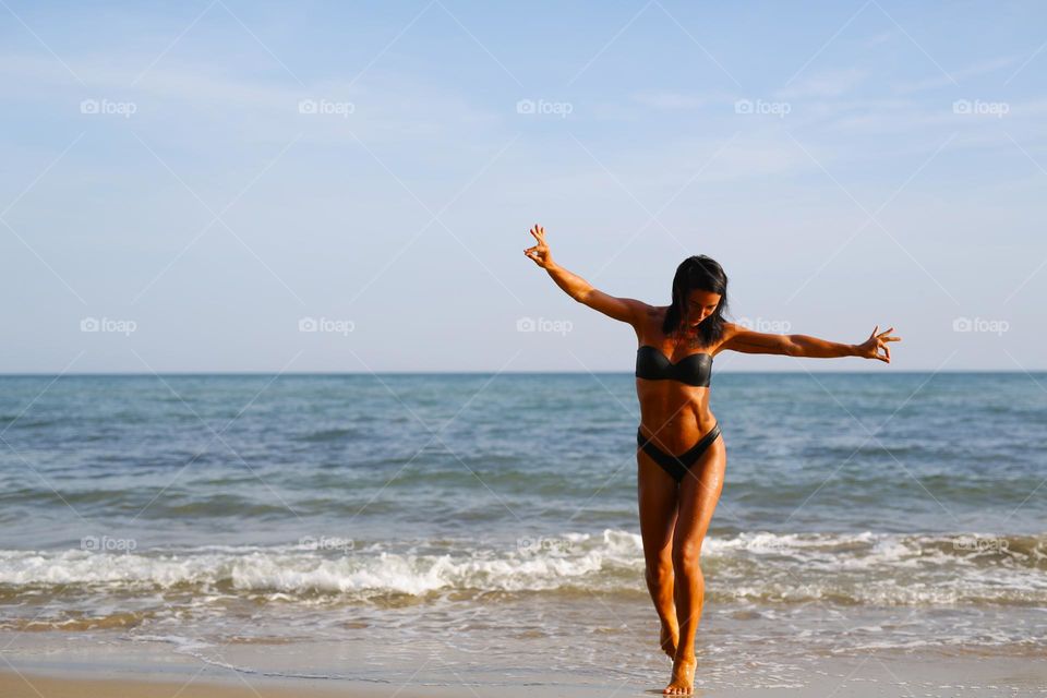 Happy women at the beach 