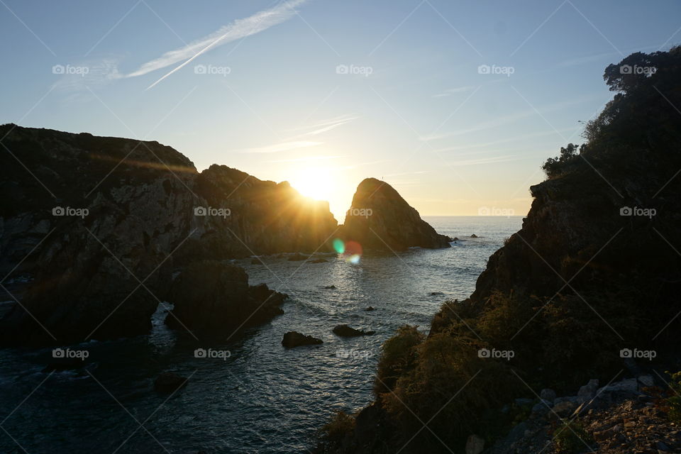 Sun kissing the cliffs
