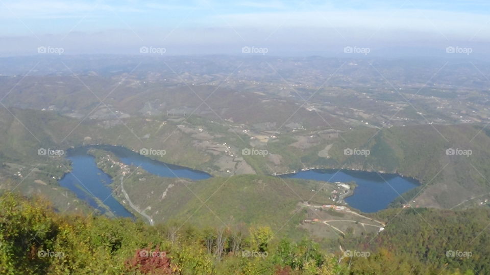 River meandres in the valley