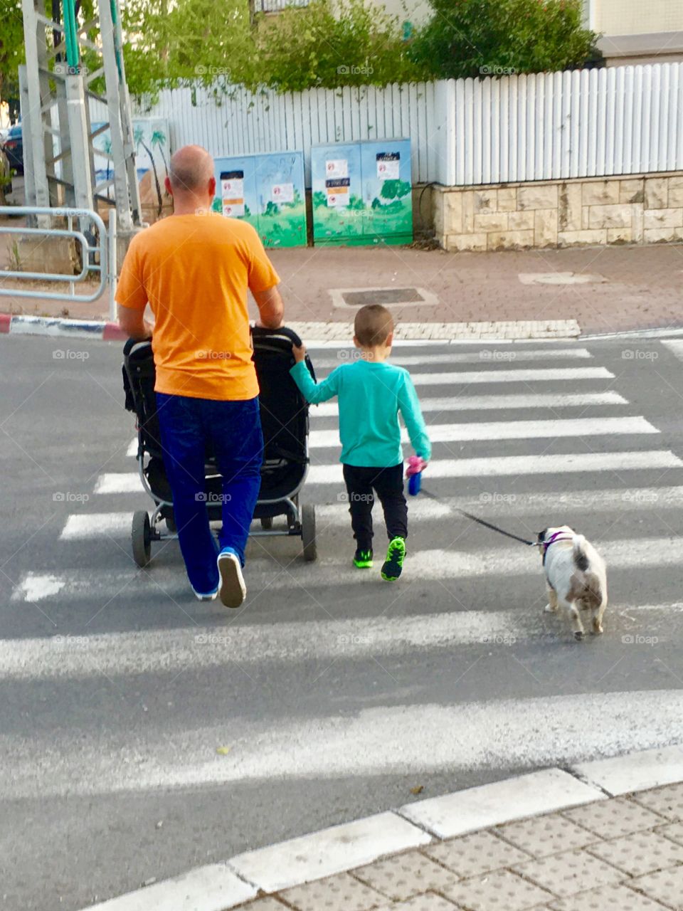 Father, son, two babies and a dog