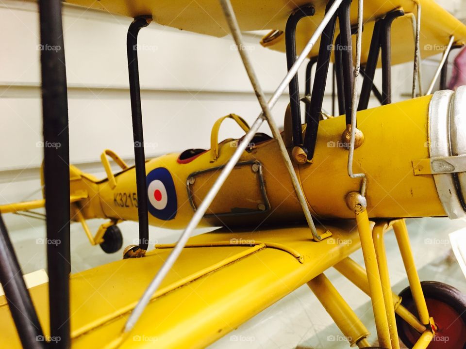 This is a very close capture of mustard yellow vintage plane 