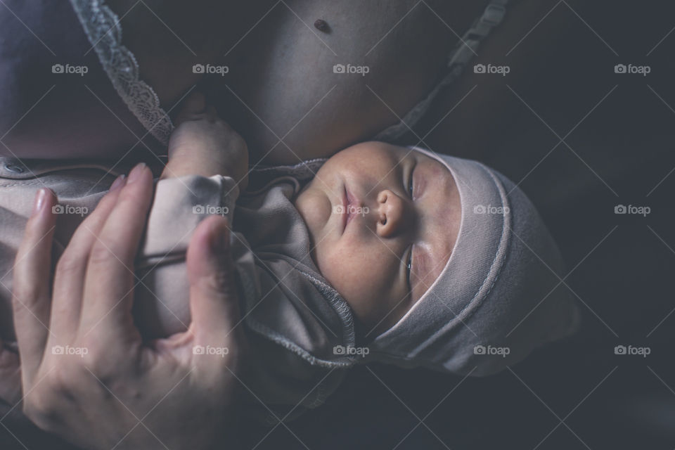 woman holding baby