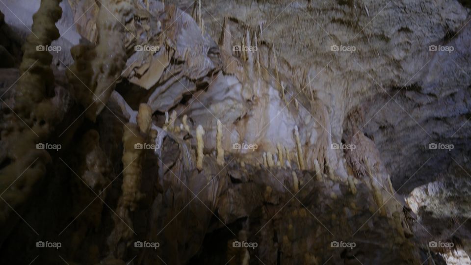 A dark underground cave in Romanian mountains