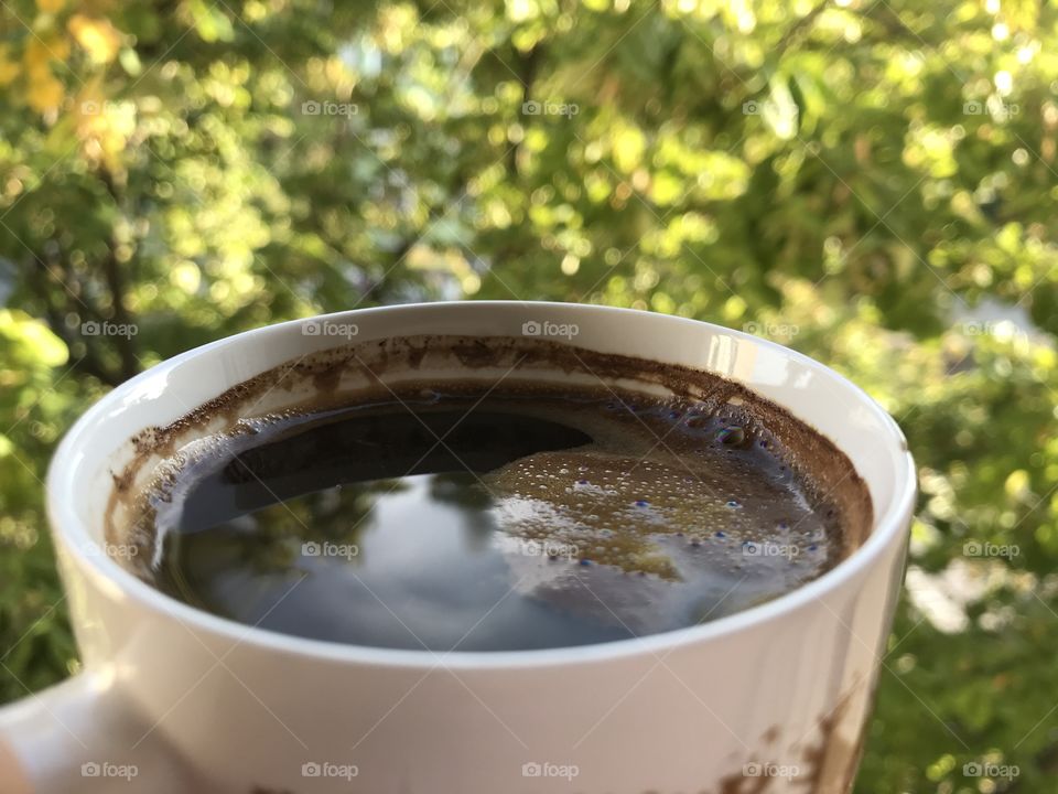 This is one cup of dark coffee.