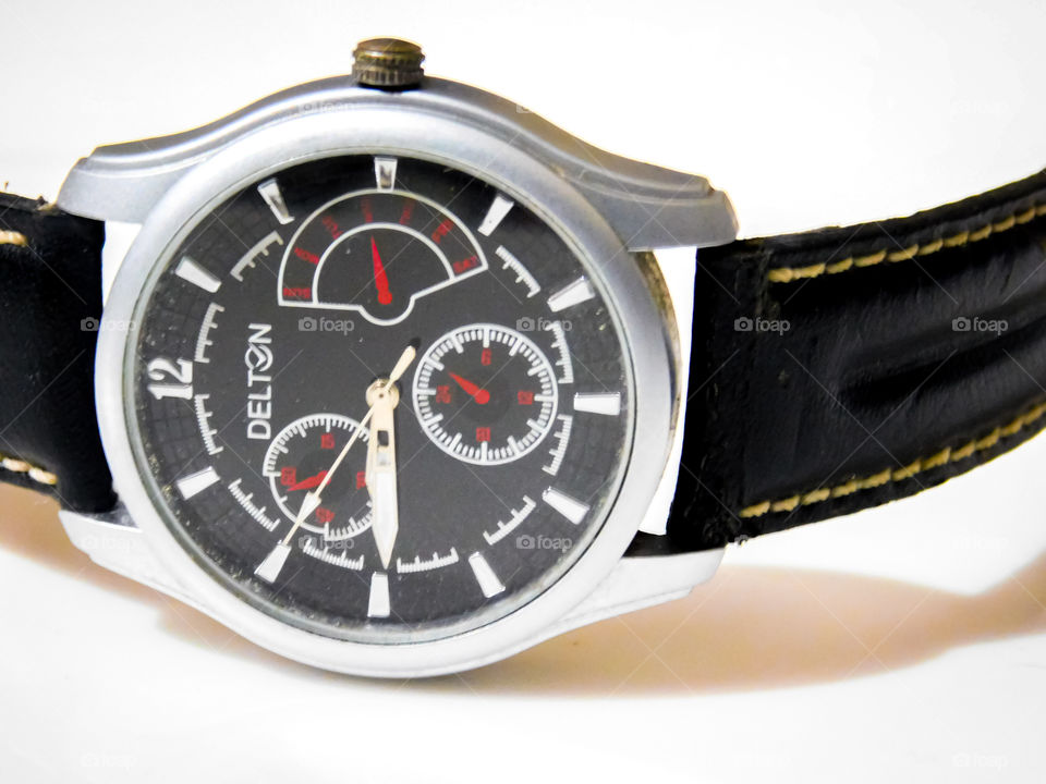Watch - My favorite Gadget. It is analog wrist watch with black dial and leather belt.