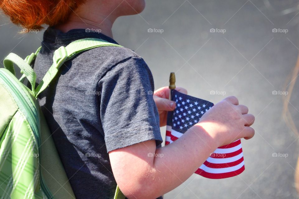 Little boy with flag