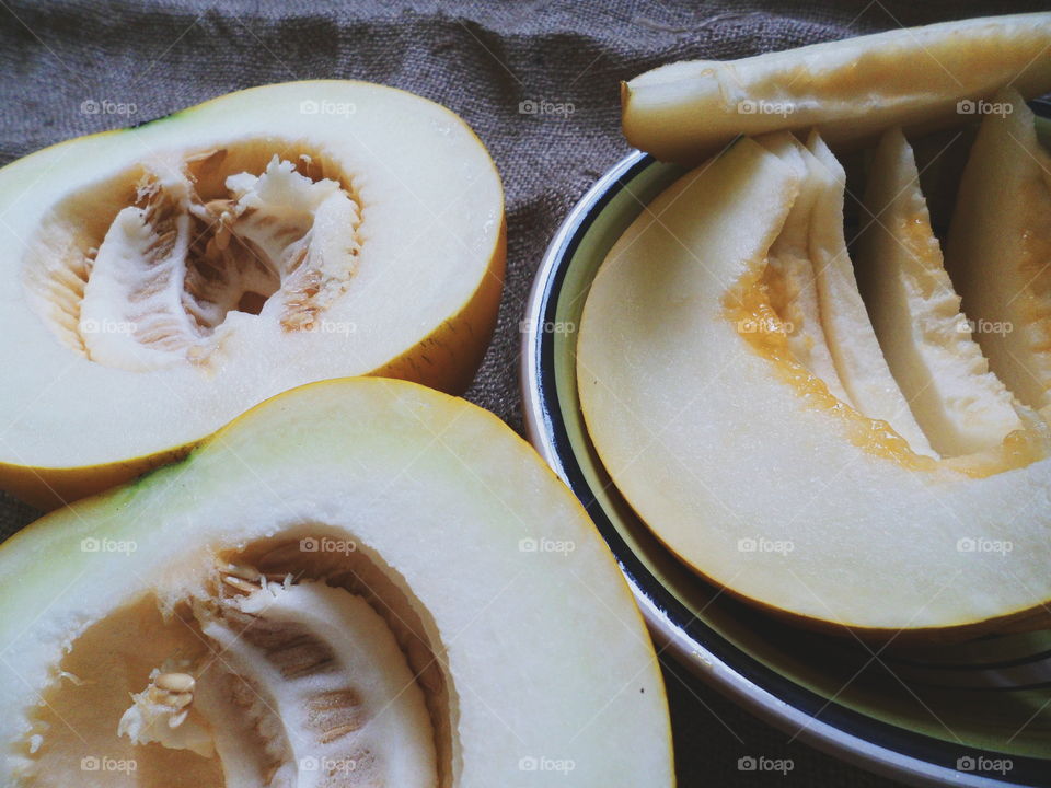 sliced ​​melon lie on the table