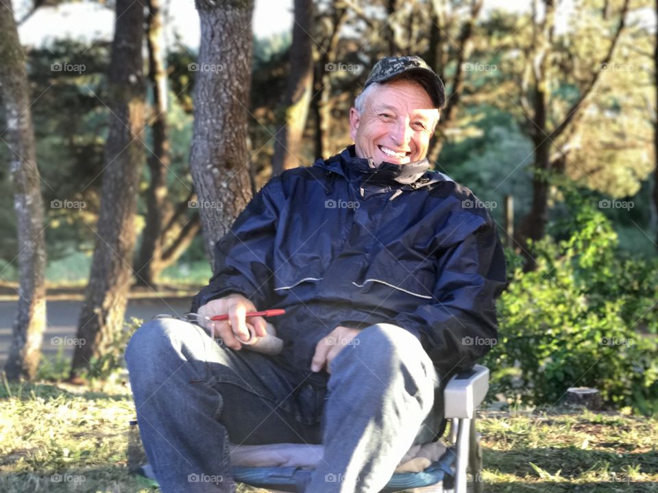 My dad, camping at Gold Beach, OR. 