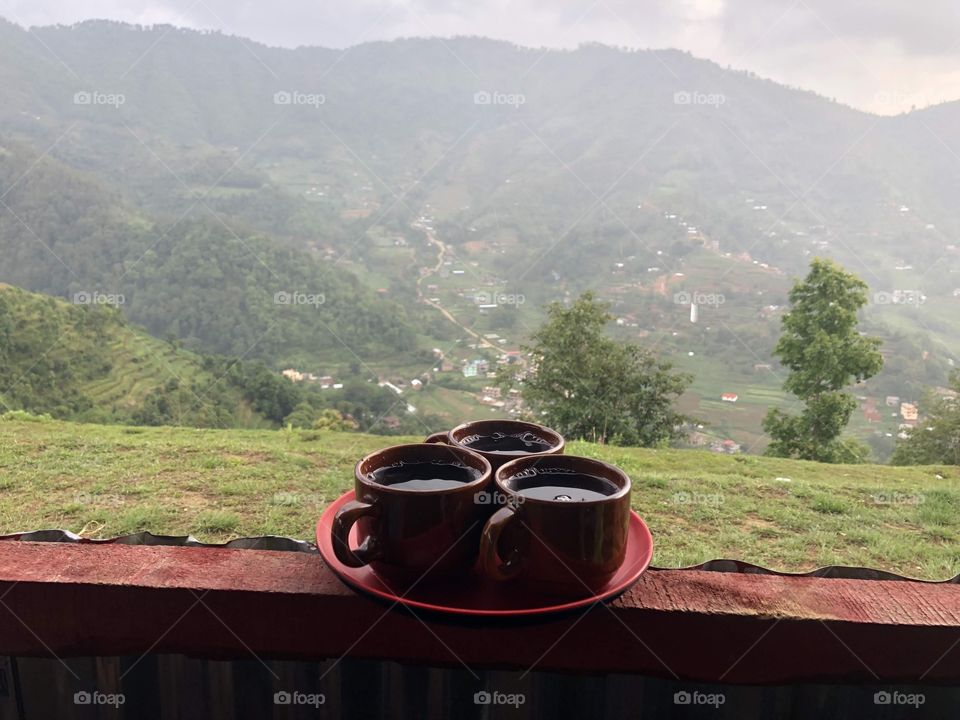 Cup of tea in a rainy weather as well as infront of mountain 🏔