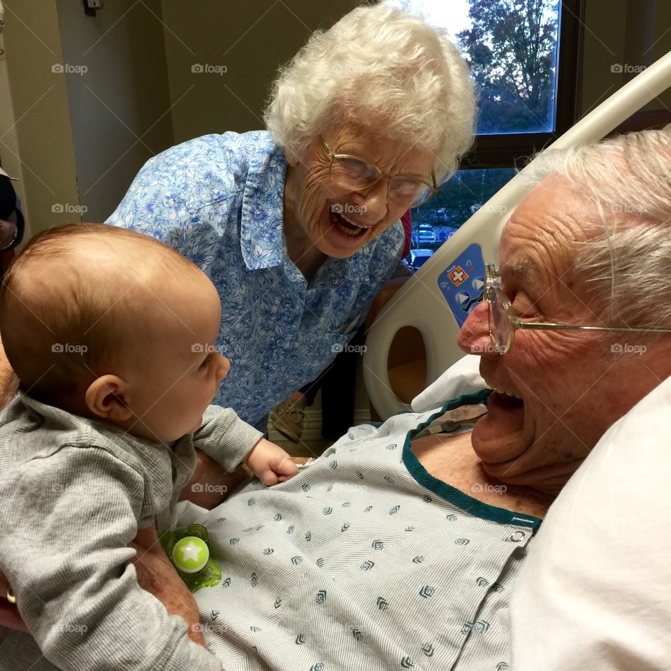 Grand child with his grandmother and grandfather