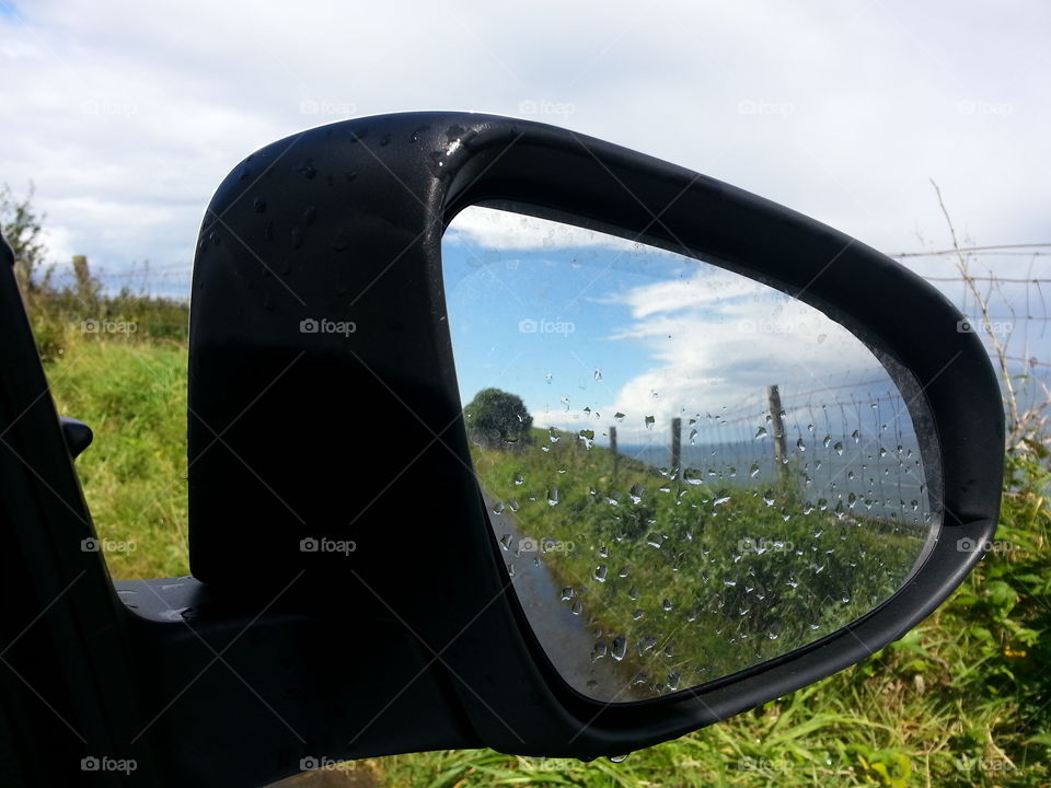 Scenary in driving side mirror