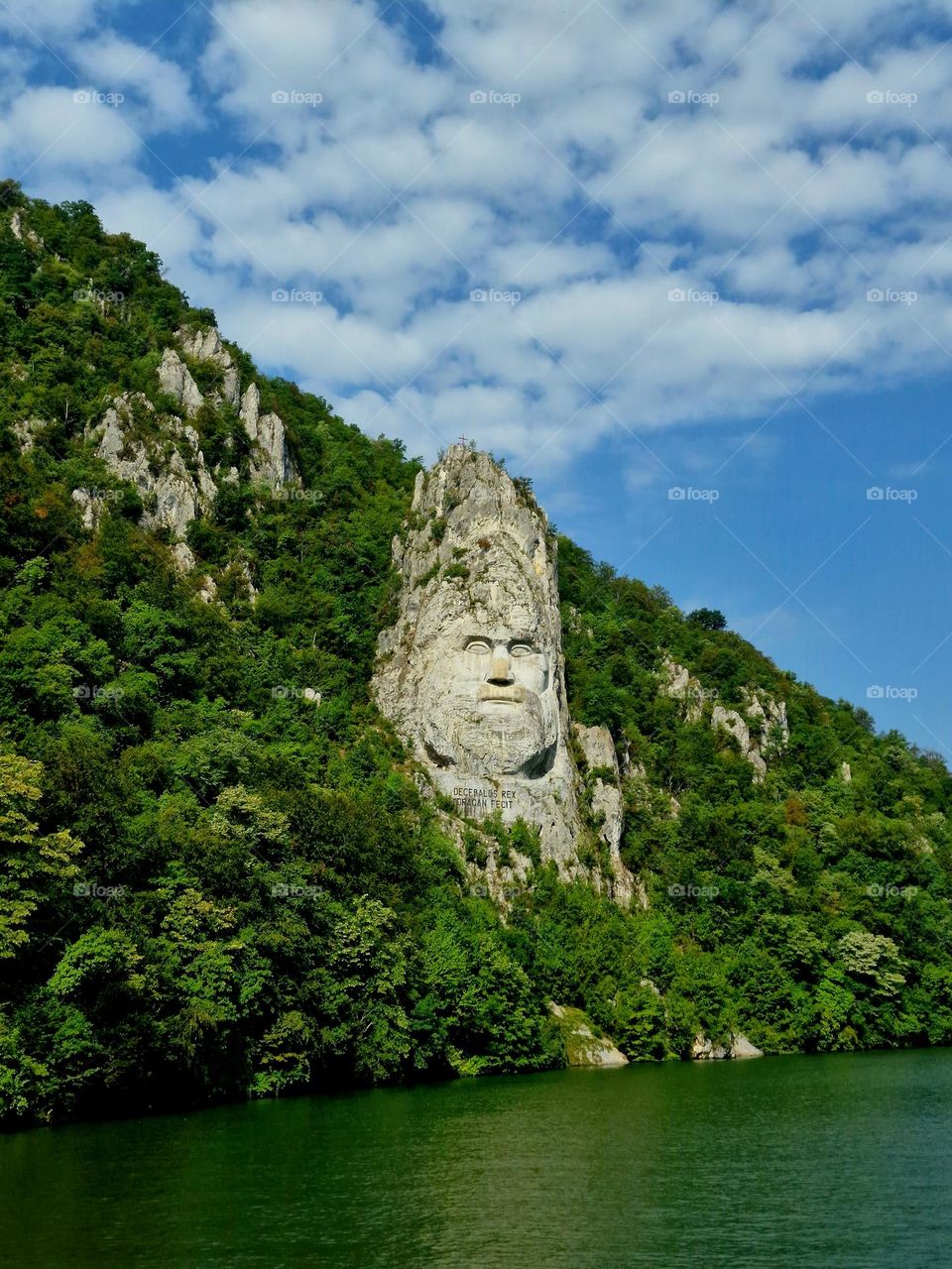 clouds above the sculpture of King Decebalus