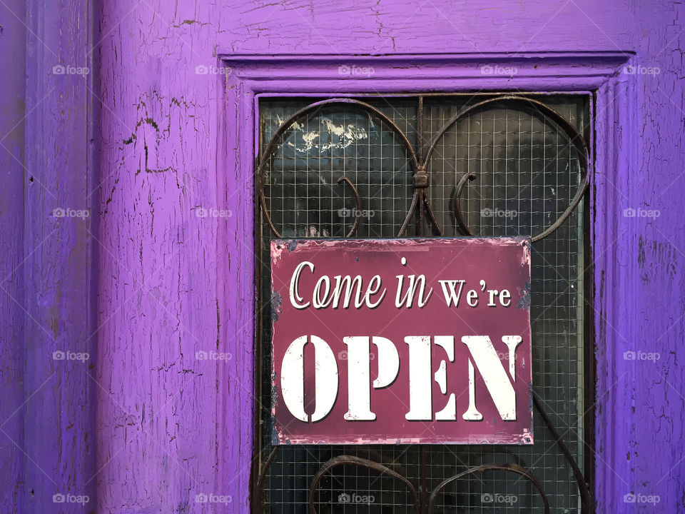 Sign board hanging on window