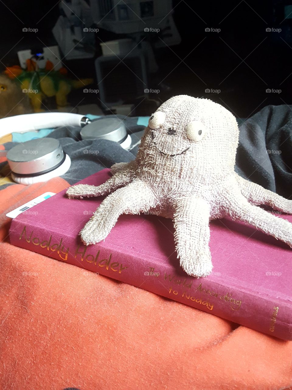 Mr Purple Octopus is reading a hard book (remember to not be on your phone to long)