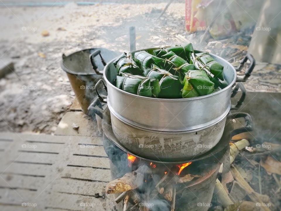 Thai dessert, Khao Tom Mas, made from sticky rice in coconut milk and insert with banana.