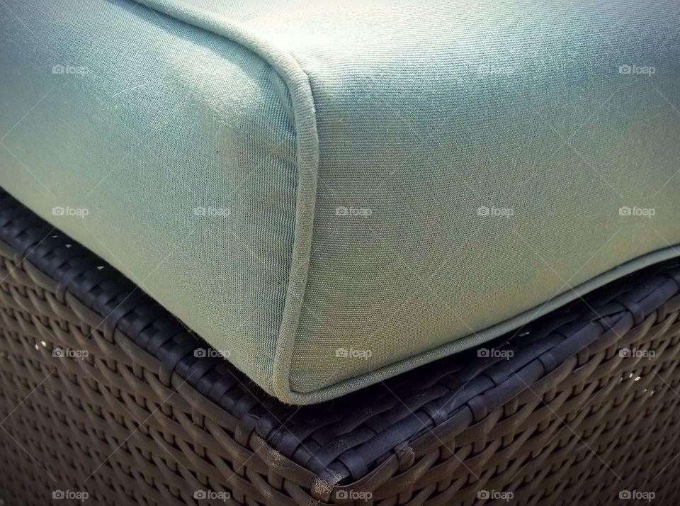 Nice textures in this photo. Our ottoman outside.