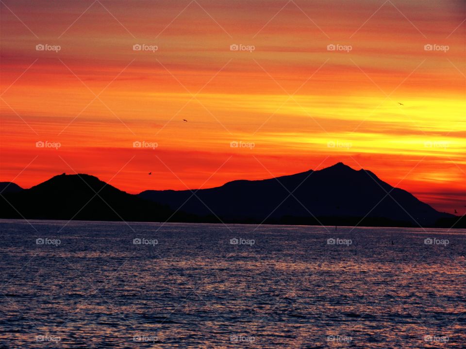 Sunset over Island of Ischia view from Naples ( Italy ).