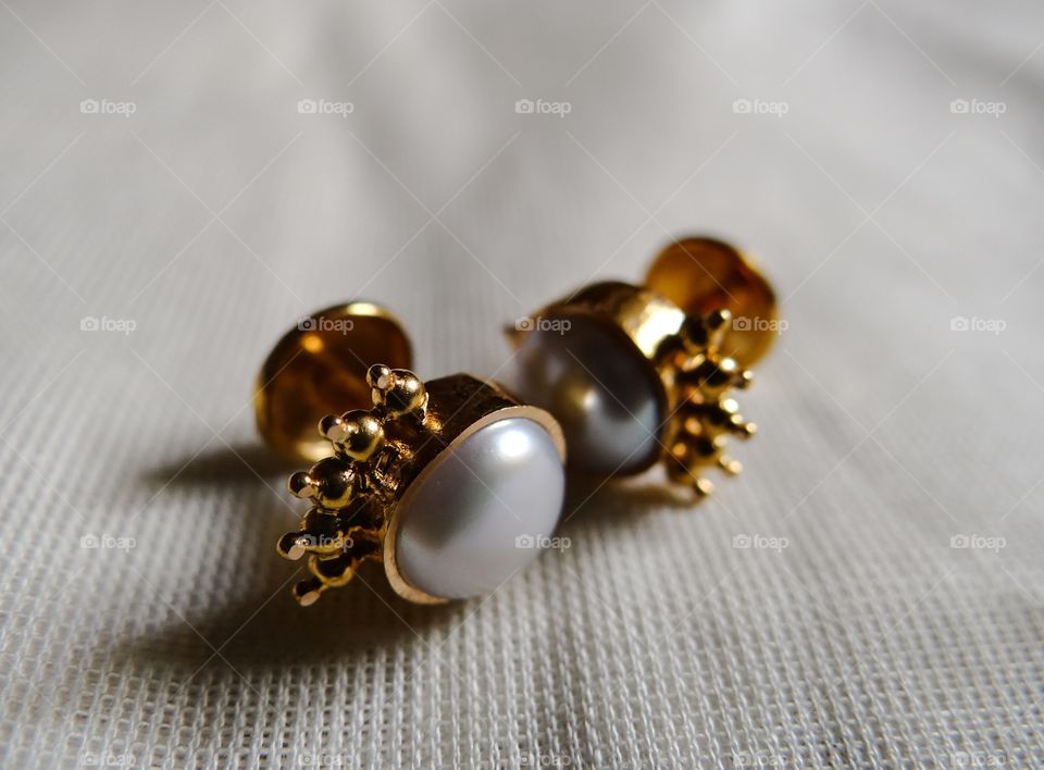 Golden Ear studs with a pearl