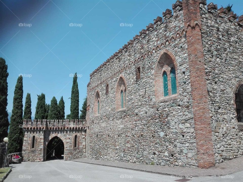 Wall of an ancient castle in Monguzzo, Italy