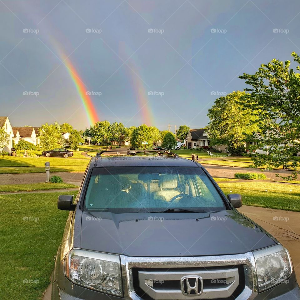 Double rainbow over Honda Pilot