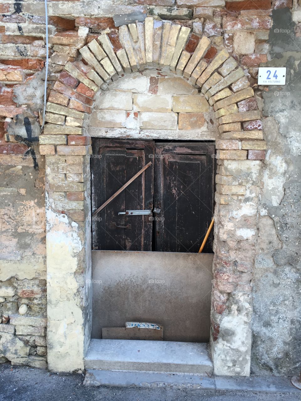 Closed door of abandoned house