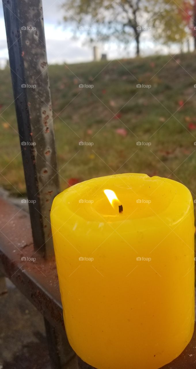 candle burning in the wind
