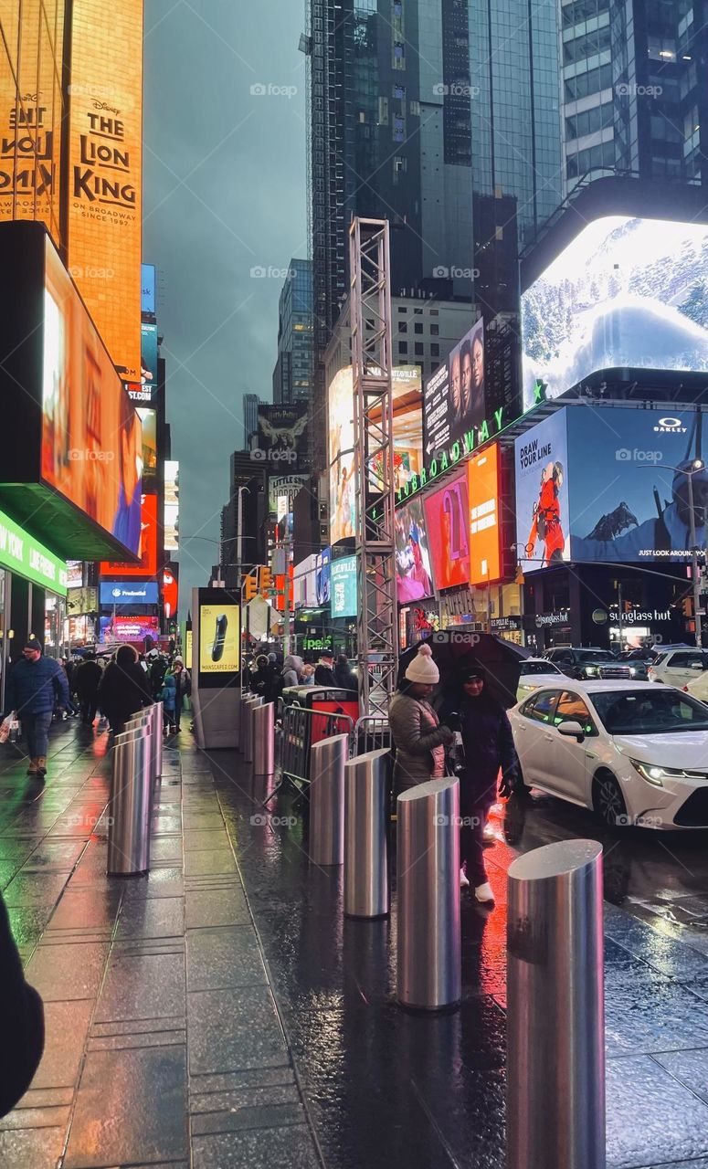 Times Square NYC at dusk on a rainy night 