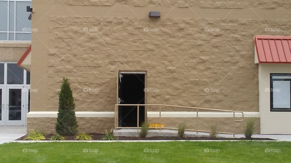 Mall wall and open door