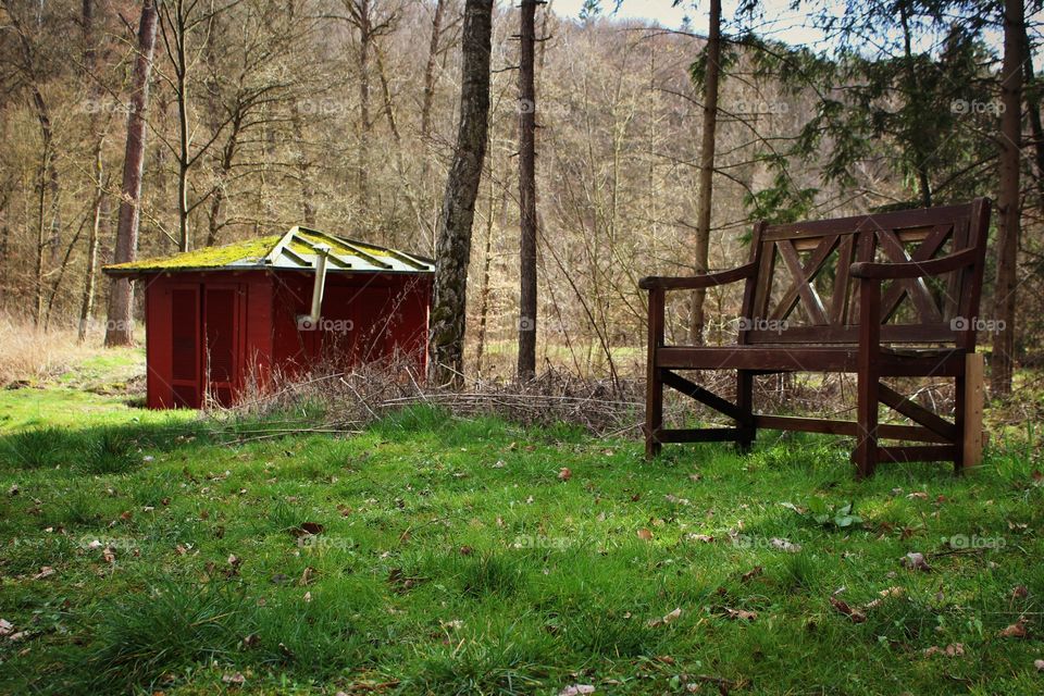 red hut and Park Bench