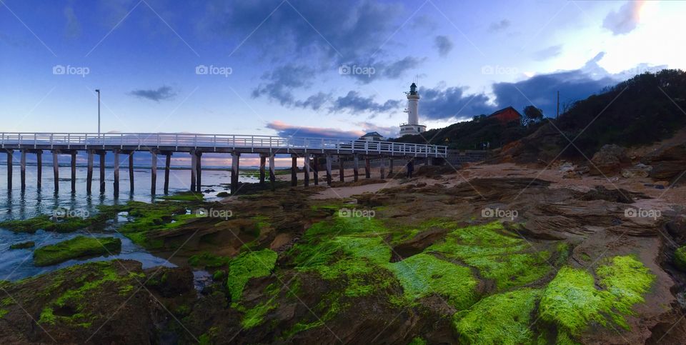 Evening photo of the Point Lonsdale Lighthouse with the Jetty