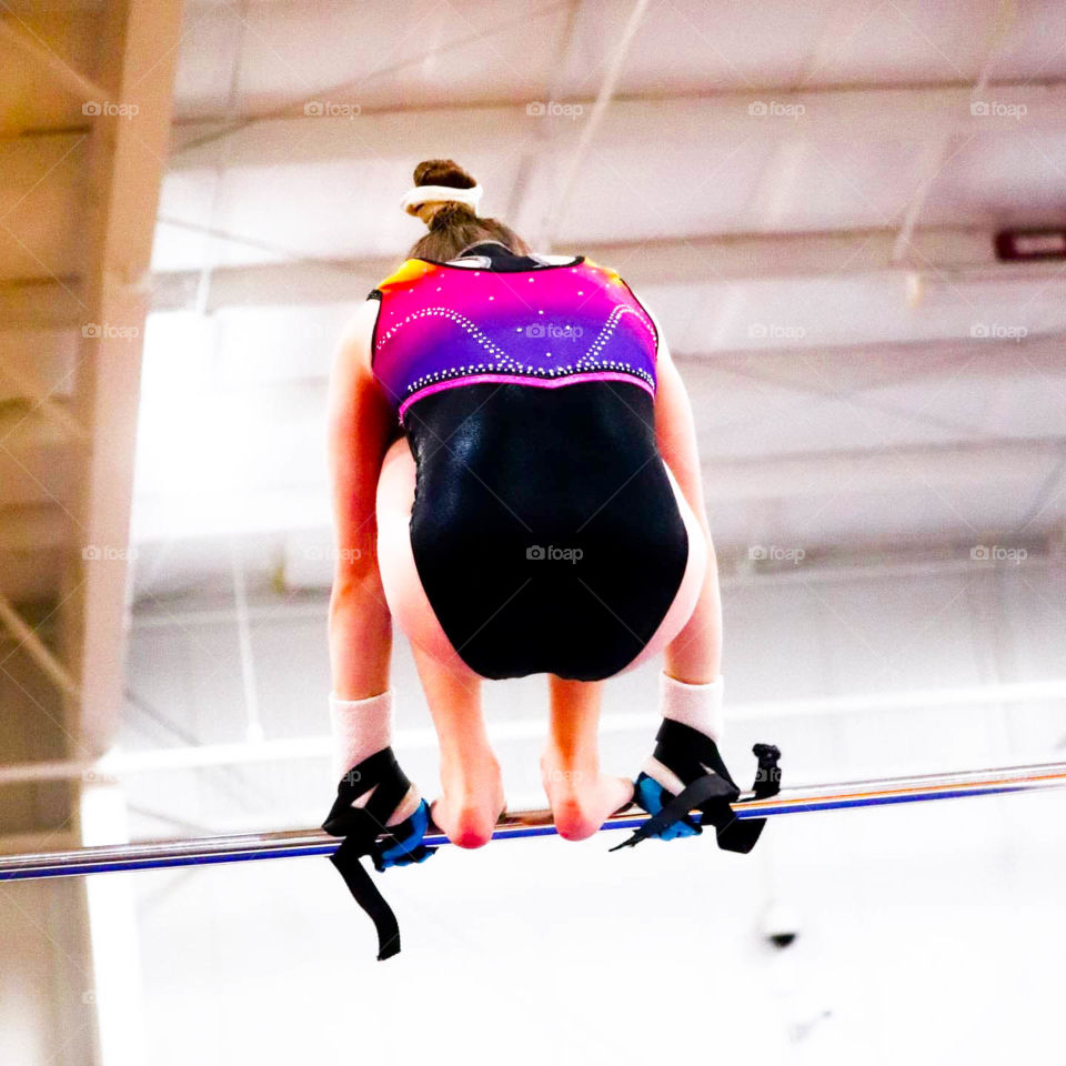 gymnastics straps on bar