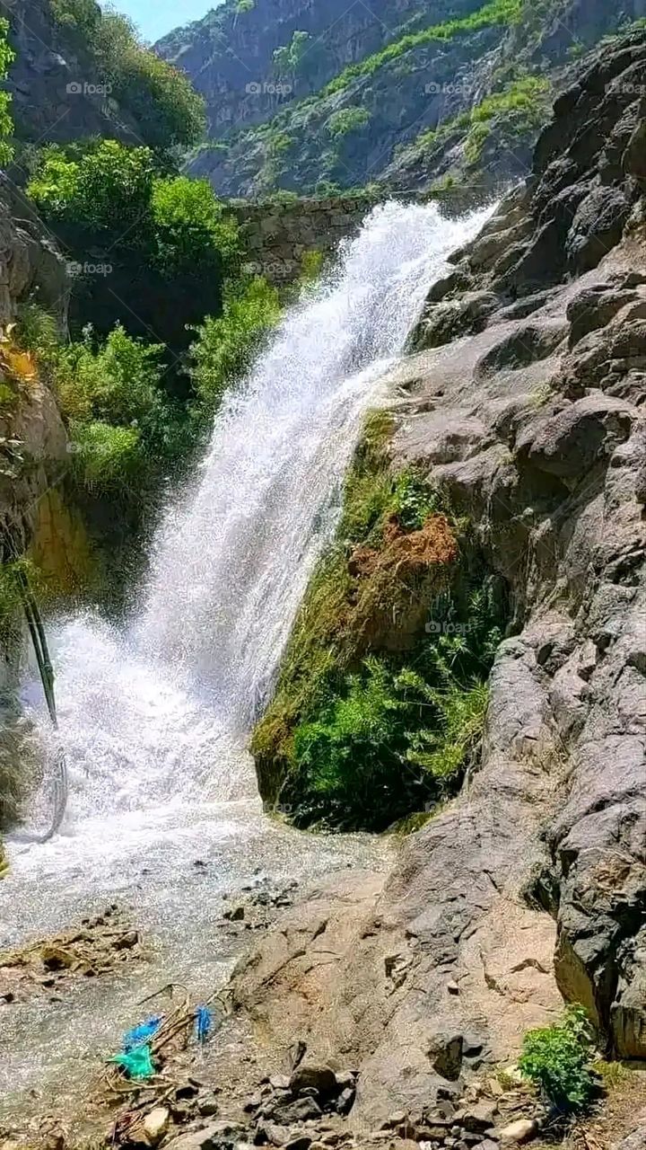 Glory be to God, the magnificent and picturesque view and the natural green trees are a view that is nothing more wonderful than it