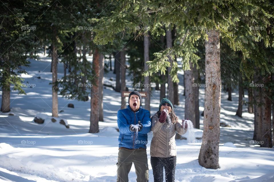 Couple enjoying the snow 