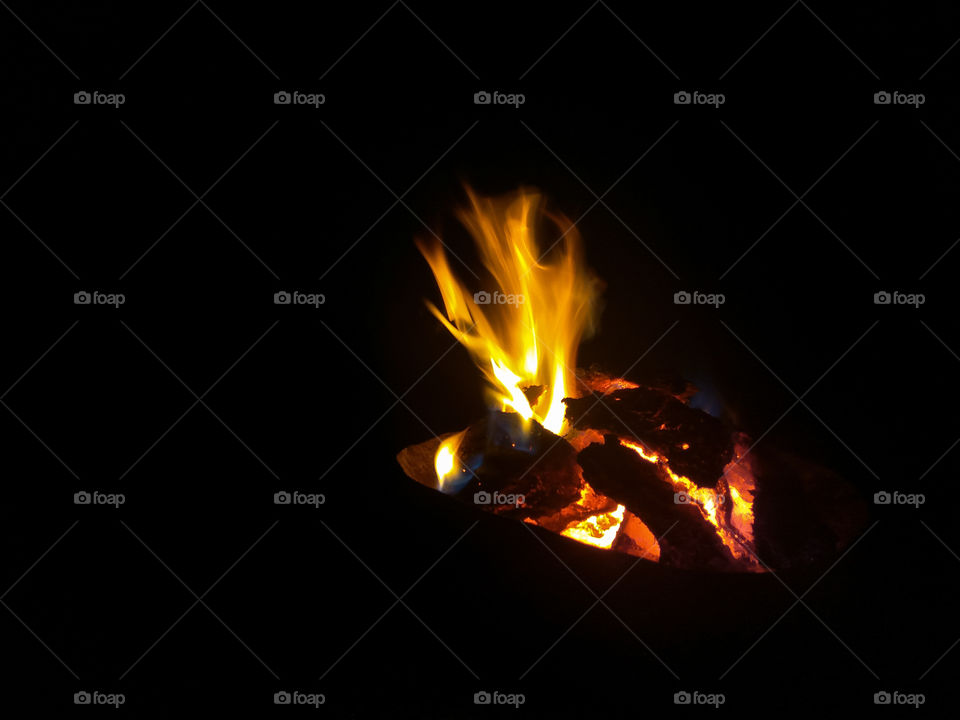 Flame in dark night