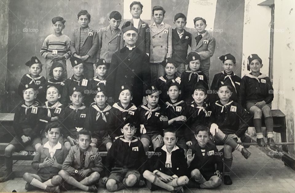 Classmates retro picture and teacher from ca 1935, Sicily, Italy