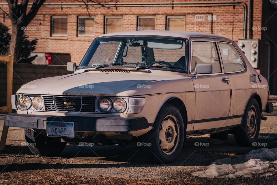 Older car and shadows.