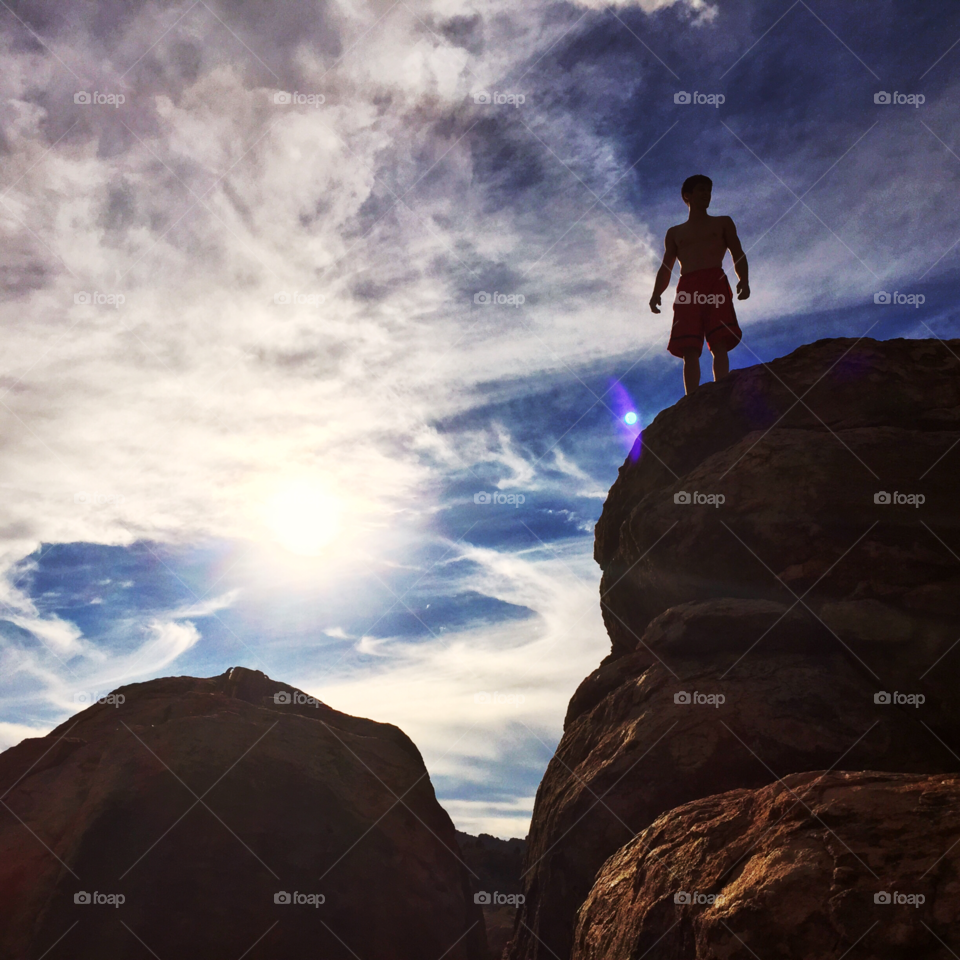 Summit. Rock Climber reaches summit