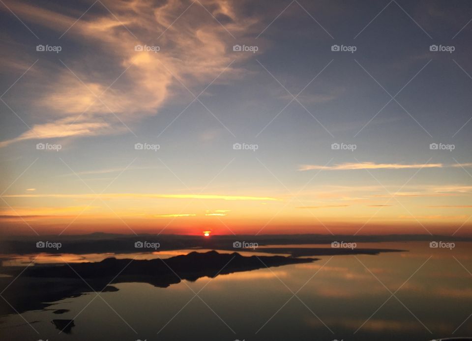 Salt Lake Sunset. Taken at sunset while flying over The Great Sslt Lake.
