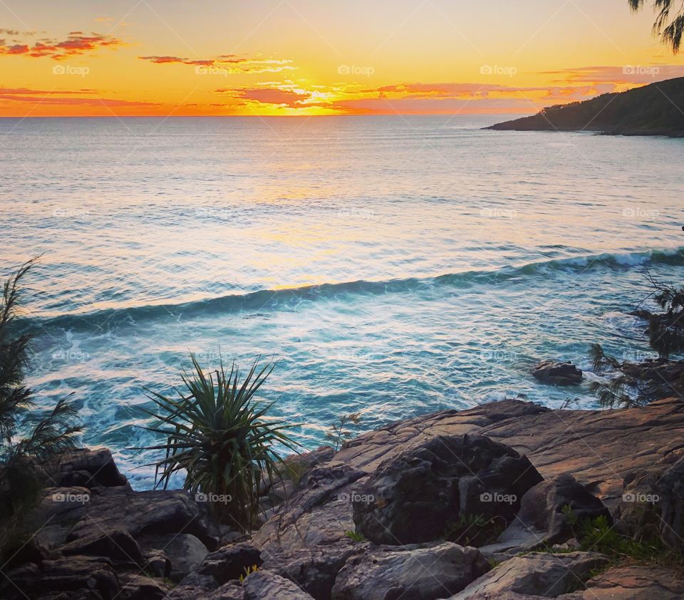 Sunrise over the sea on a perfect morning at Noosa