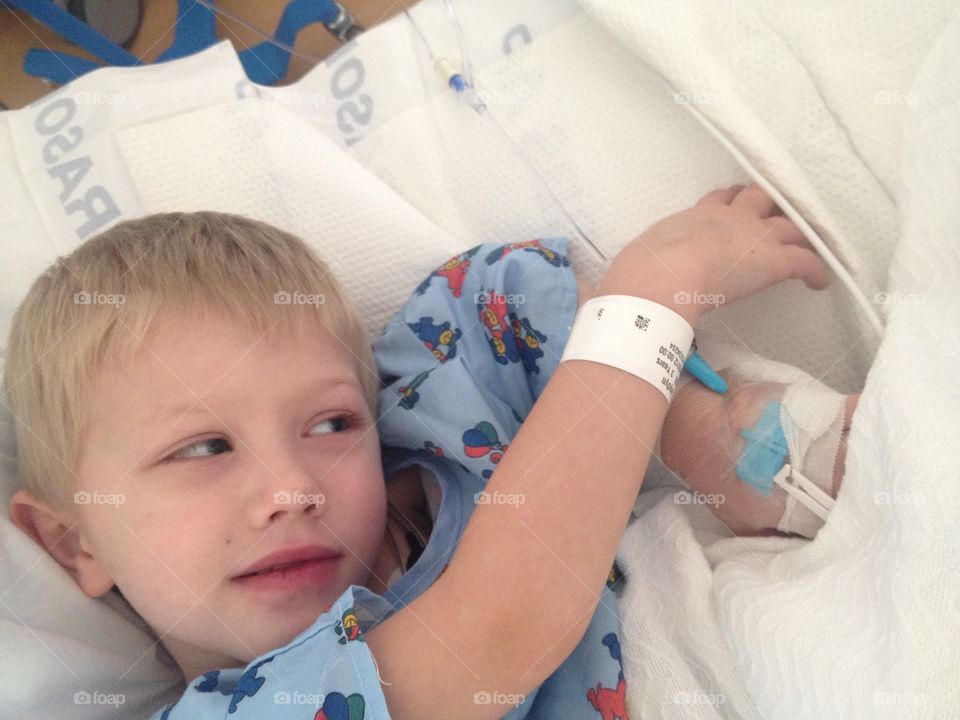 Boy in hospital bed