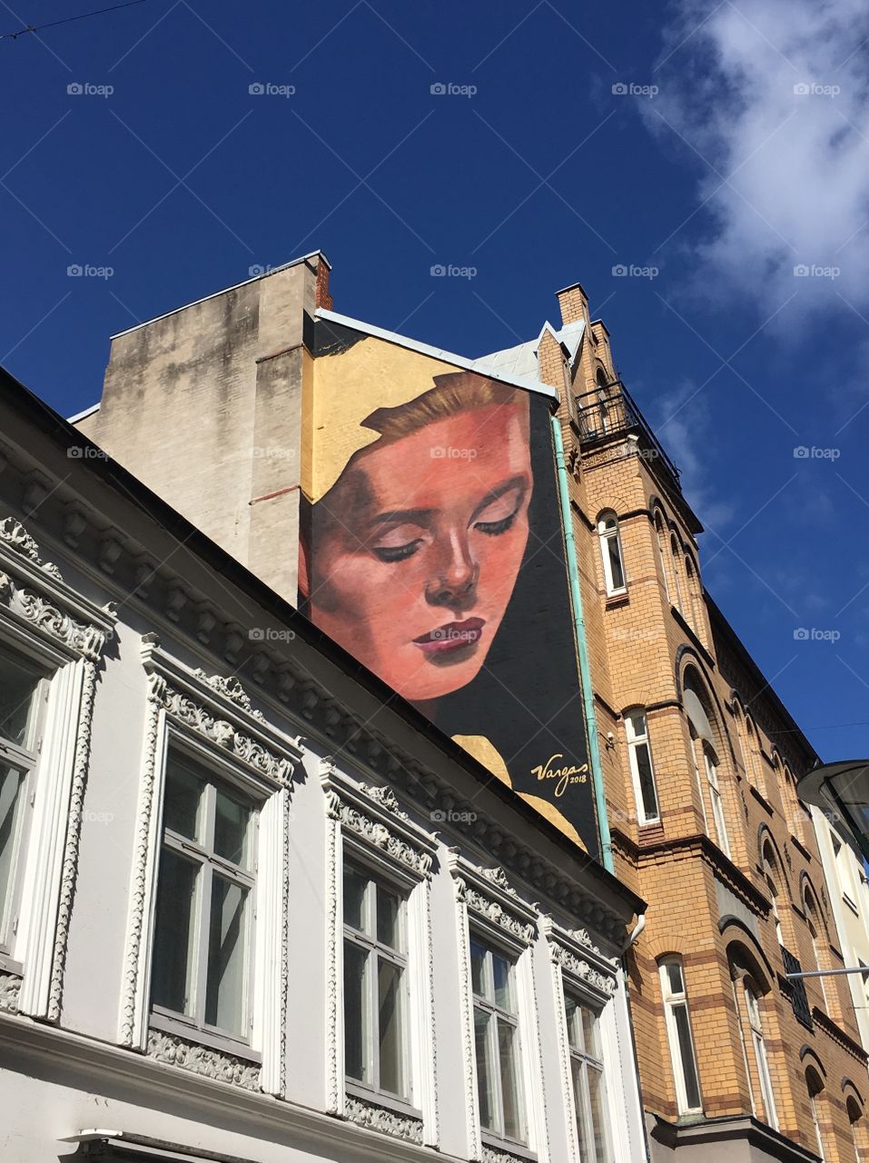 Woman street art, mural on building