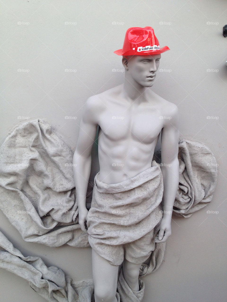 red wall sculpture man by linhof