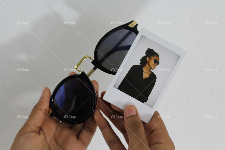 Polaroid and shades.