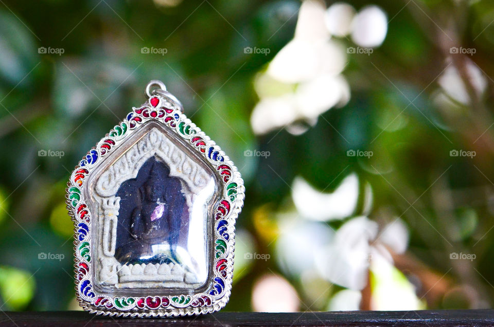 Real silver casing with amulets collection.