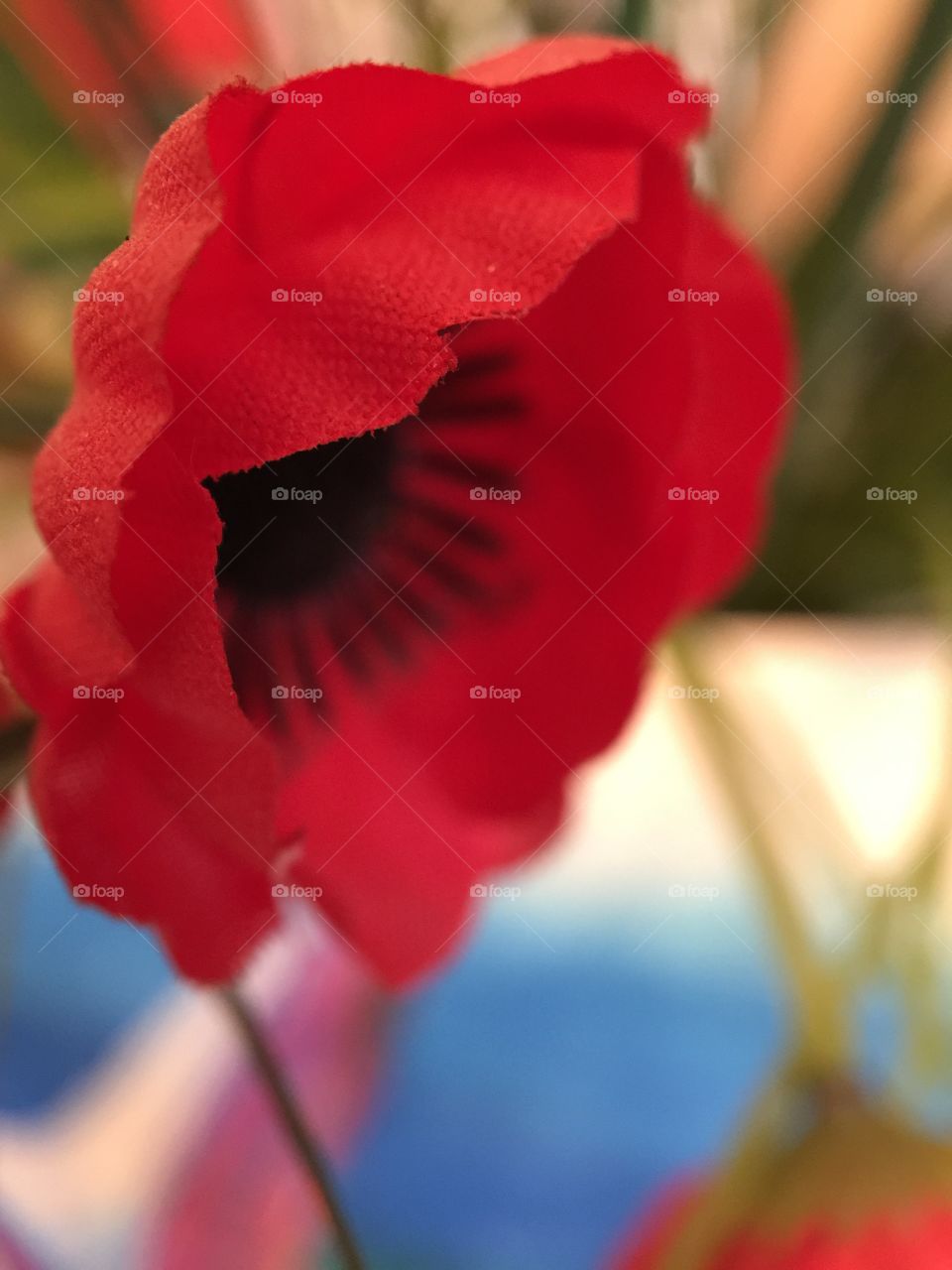 Red artificial flower